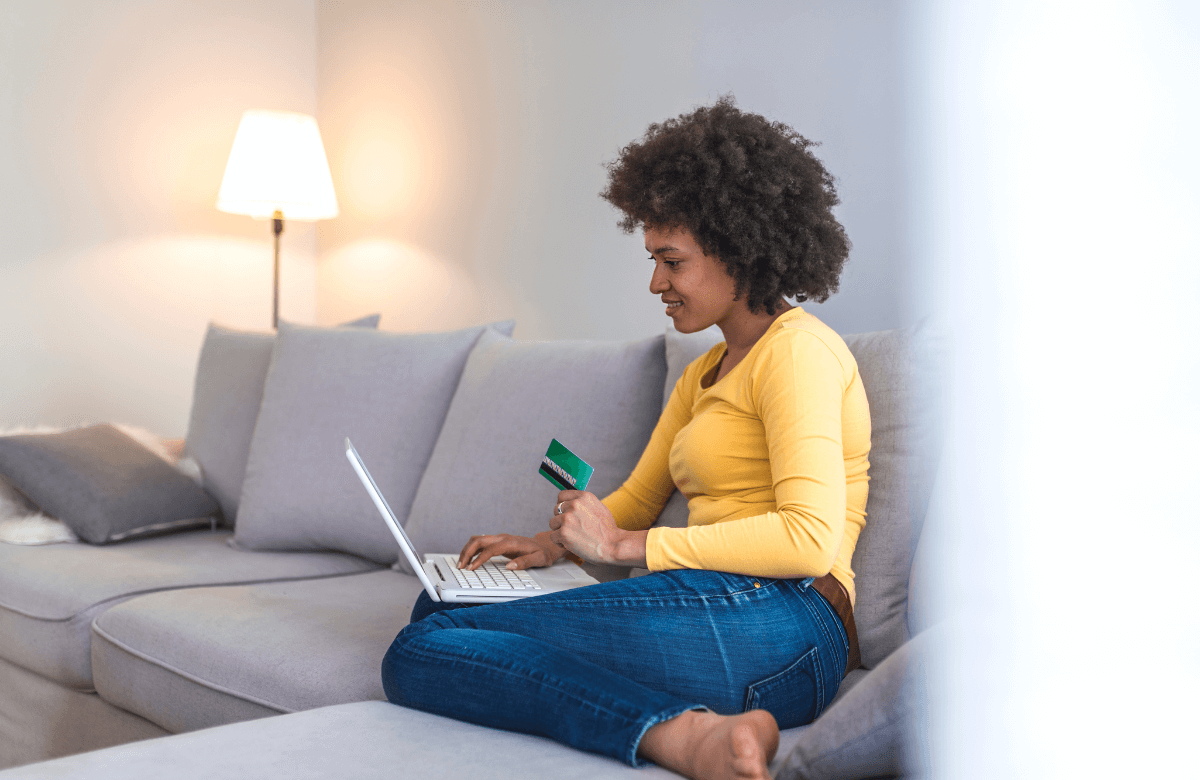 A woman applying for online payday loans in Edmonton from home